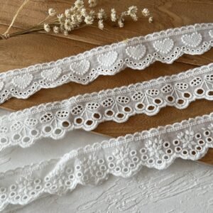 Versatile white cotton lace trim with intricate hollow patterns for dresses, skirts, or collars
