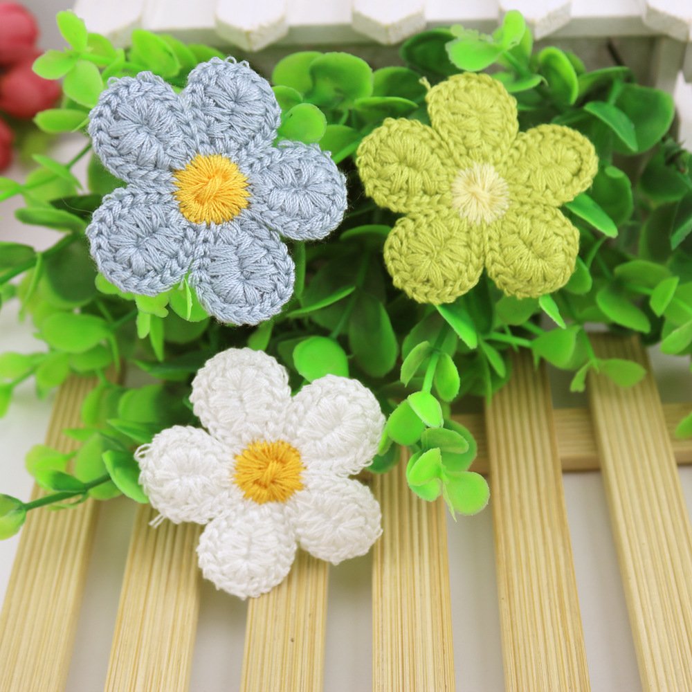 Set of handmade crochet flower appliques in green and white cotton yarn embroidery patches