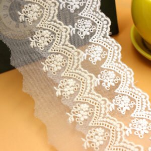 Elegant embroidered tulle lace trim with intricate floral patterns, perfect for bridal, fashion, and DIY projects