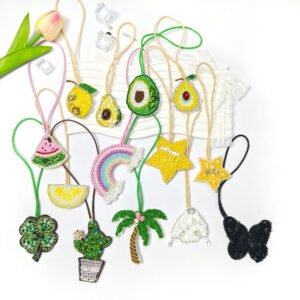 Set of handmade embroidery pendants including avocado, lemon, cactus, rainbow, star and butterfly applique