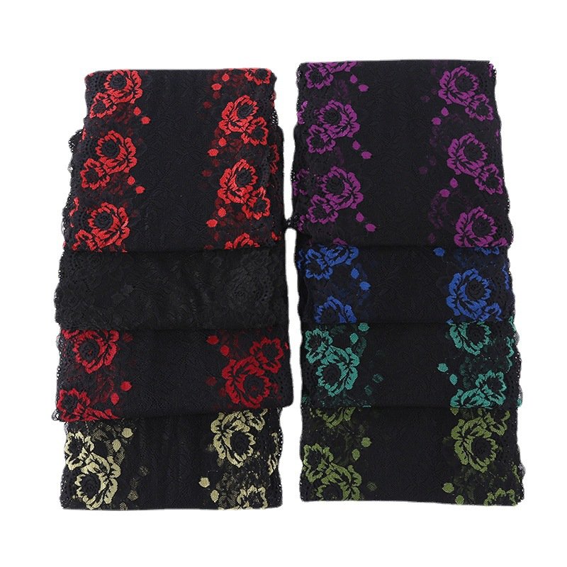 Close-up of black elastic lace with floral embroidery, showcasing intricate design perfect for any DIY project