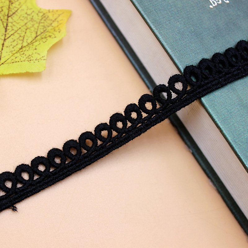 Soft and delicate white water-soluble lace trim for fashion, home décor, and DIY accessories