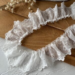 Elegant white ruffled lace trim for skirts, collars, and home décor embellishments