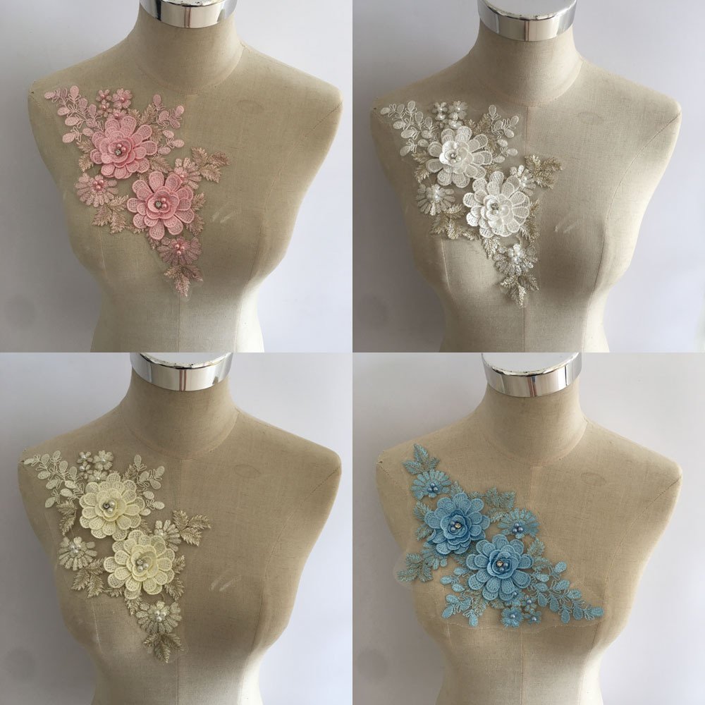 3D floral hollow lace appliqué patches available in ivory, champagne, blue, and pink for global fashion decoration
