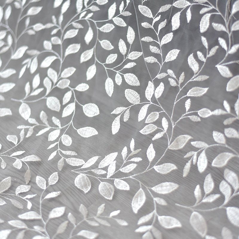 Close-up of White Leaf Lace Fabric Embroidery for Sewing, DIY and Decoration