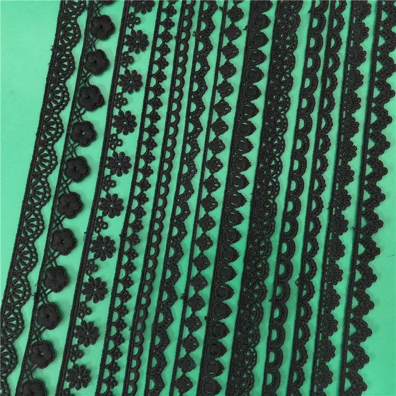 embroidered guipure lace edging black ribbon for skirts, veils, and fashion design