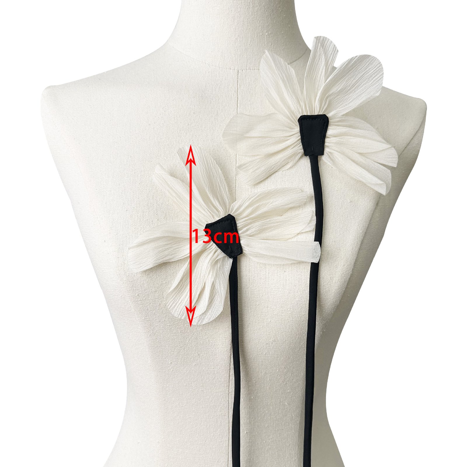 Size reference of fabric flower appliqué with long stem for garment design