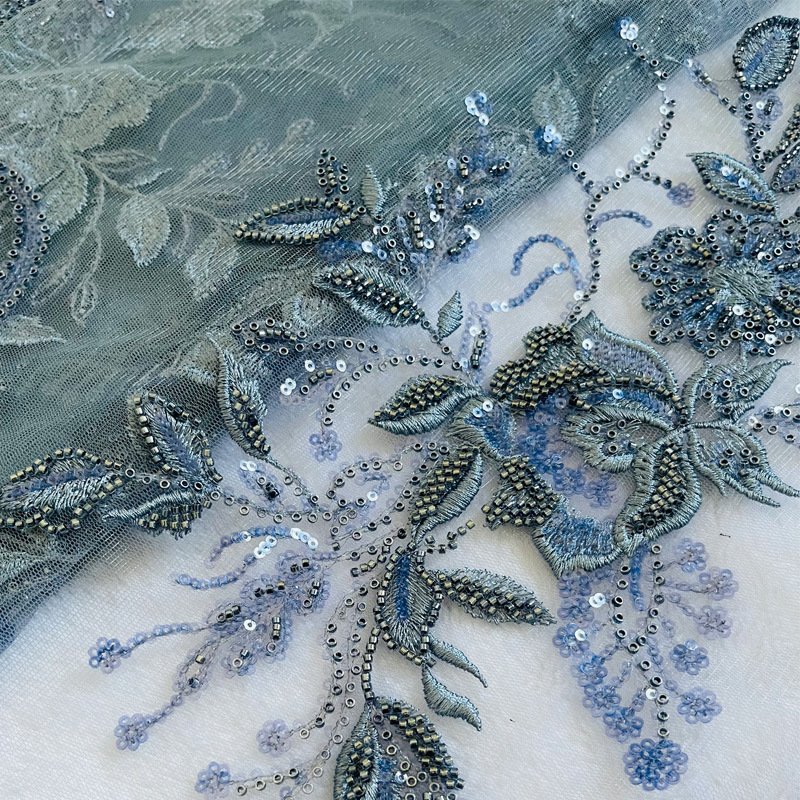 Navy blue beaded applique with intricate embroidery, used for dresses, wedding wear, and fashion garment decoration