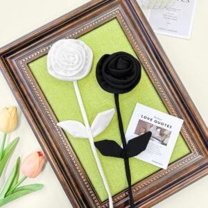 Black and white polyester fabric rose appliqués displayed as decorative set